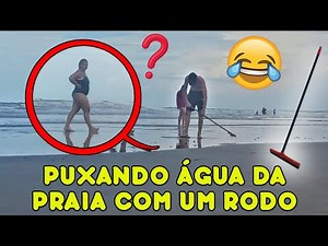 PUXANDO ÁGUA DA PRAIA COM RODO (DESAFIO)