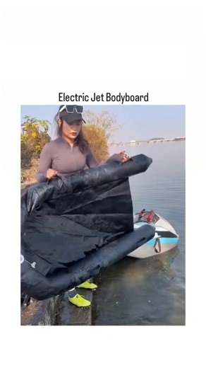 NONIVAL on Instagram: "Dm for Credit / Removal The post features a viral recreational gadget with over 22 million views, showcasing the assembly and operation of a portable "Rush Wave" aquatic go-kart. The footage documents the user inflating the pontoon chassis and attaching the steering column, before executing high-speed maneuvers across the lake surface. Replies are dominated by "Shut up and take my money" comments, though some users question the stability of such a lightweight craft in chop