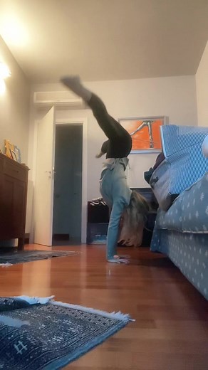 Gymnastic Movements in a Cozy Bedroom Setting