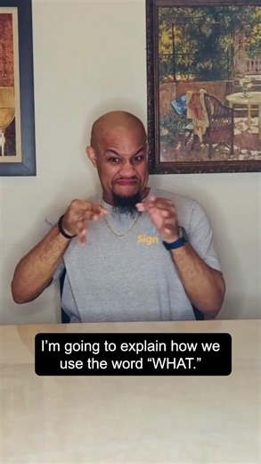 SignOn Ambassador Gill elaborates on how to use the sign “WHAT” in conversation. Want to learn more about ASL? Connect with us and a Deaf Ambassador at SignOn today! SignOnConnect.Com #ASL #AmericanSignLanguage #SignLanguage #SignOnConnect Video Description: Gill, a Black man with a bald head and black goatee beard, wearing a gray SignOn shirt, silver chain, and wristband. He is sitting at a table, then in the kitchen by the dishwasher, then in the entryway/living room, then on the living room c