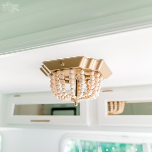 DIY Wood Bead Chandelier - $7 Boho Light Fixture Makeover