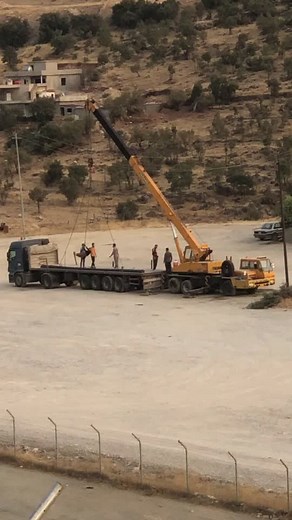 Crane Operation: Guiding Heavy Machinery in Action