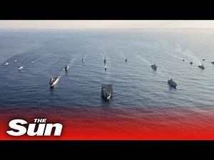 Royal Navy carrier leads 25 warships putting on a show of force to Putin