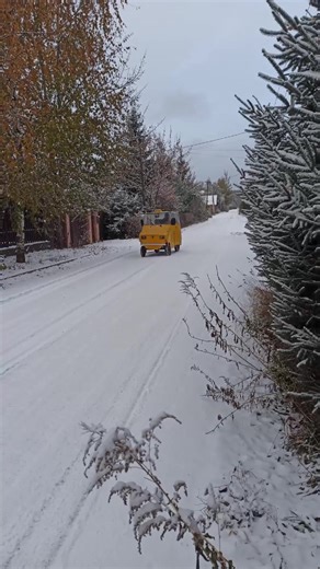 Three-Wheeled Taxi Drifting in Snowy Streets