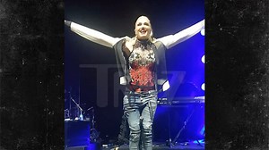 Gwen Stefani Wears Jacket Gift from Fan During Dubai Concert