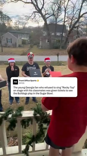 A young Georgia fan refused to sing Tennessee’s “Rocky Top” with his classmates out of his loyalty to the Bulldogs. Now, he’s going to see Georgia play in the CFP Quarterfinal Sugar Bowl in New Orleans. (🎥 via @fanatics) | Front Office Sports