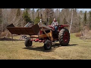 International Farmall 656 tractor with hydrostatic drive, factory loader. bennettauctionservice.com