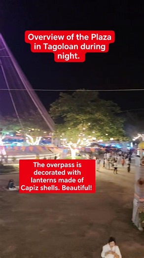 Overview of tbe plaza of Tagoloan during night. The overpass is decorated with hanging round lanterns made of Capiz shells.Beautiful! #fbvideopost2026 #overviewoftheplazaoftagoloan #lanternsmadeofCapizshells #beautiful | Vita Bodiongan Iman