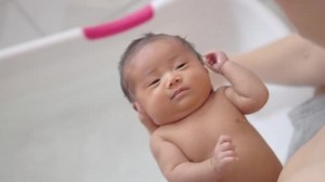 Adorable Asian Newborn Baby Girl Washing Hair Taking Bath Her