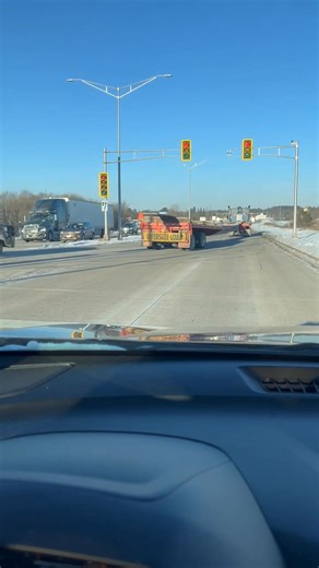 Our drivers, EJ, hauling a 130 foot sheet to a fabricator in Eau Claire and Brody running pilot and rear steer... Pretty awesome sight to see. Video courtesy of EJ's wife Kim! Thank you for sharing. | Springbrook Express, LLC