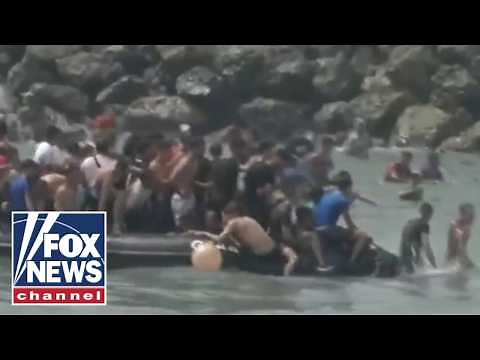 BREAKING: Migrants storm city border as national emergency requested