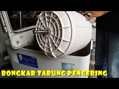 Melepas tabung pengering mesin cuci