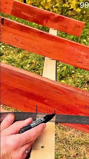 Checking vertical beam alignment with carpenter’s square