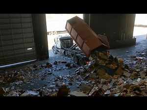 Trucks Unloading at Recycling Center