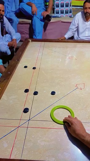 Engaging Shuffleboard Game Among Friends