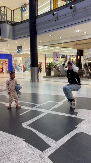 Dancing Duo Mimics Moves Together