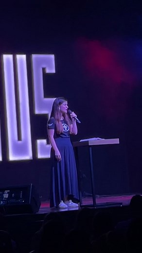 Religious Speaker Inspires Audience with Passionate Message