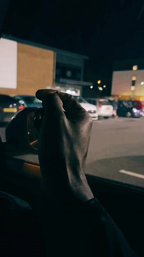 Nighttime Reflection: Tapping on a Car Window