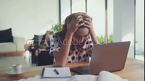 Frustrated annoyed young woman confused by computer problem annoyed businesswoman feels indignant about laptop crash bad news online or disgusting video on web stressed student looking at broken pc