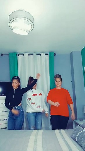 Synchronized Dance Routine in a Modern Bedroom