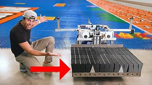Watch This Robot Build a Super Mario Bros. Mural Using 100,000 Dominos
