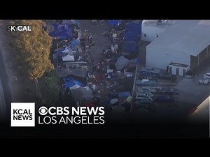 Officials clear homeless encampment in Van Nuys near 405 Freeway