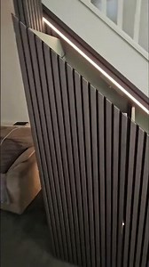 Integrated LED lighting along the staircase.