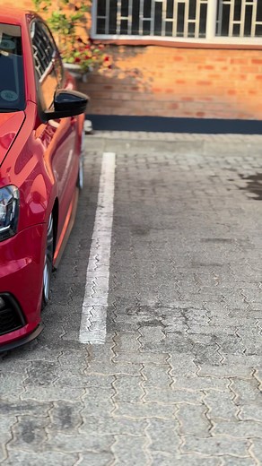 Red Volkswagen Hatchback Showcased in Stunning Details
