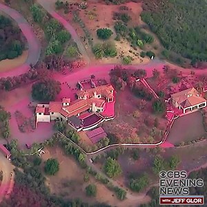 23K views · 153 reactions | WATCH: During a lull in wind gusts in Southern California, firefighting supertankers coated neighborhoods in bright pink Phos-Chek, a flame retardant, while battling the destructive #WoolseyFire; forecasters say wind conditions are likely to worsen Monday. https://cbsn.ws/2qGTiTq | CBS Evening News | Facebook
