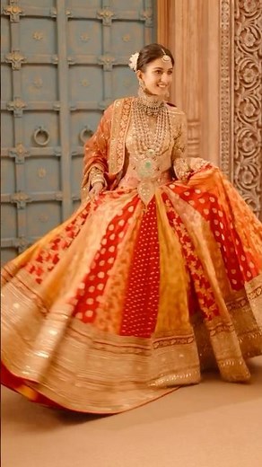 Radhika Merchant’s Bridal Lehenga — A Fairytale in Ivory & Red