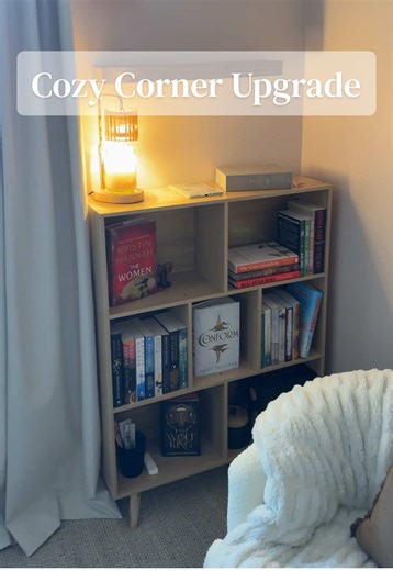 Simple, neutral & a surprising amount of storage space. This shelf is my favorite cozy corner upgrade yet. #cozycornerinspo #readingnookinspo #simplebookshelf #smallspacebookshelf #smallspacestorage