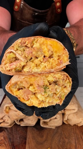 Kyle Smith on Instagram: "Part 6 of shred it and set it: SLOW COOKED BREAKFAST BURRITOS ARE NOW A THING. Just toss everything you love in your breakfast burritos in to a crockpot and like magic… you have 11 breakfast burritos. Hit me with a “SHRED IT” in the comments if you dig this one… and as always macros and dill recipe will show up in the comments soon . Ohhh and did we mention my new special edition @dadgang.co hat just dropped. Literally my favorite hat company in the world gave me a hat