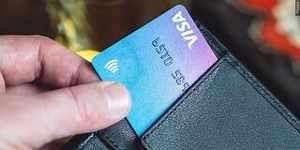 Good Question: Why do businesses charge a fee when you pay with a credit or debit card?