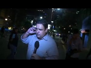 CNN reporter hit by protester, knocked over