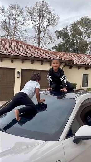 Dad catches daughter and little sister climbing on top moms new car #shorts