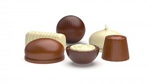 Assorted chocolate candies on white background