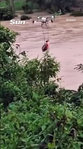 Incredible moment drone SAVES man from drowning as floods hit Vietnam #flood #weather #vietnam