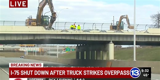 I-75 closed from Perrysburg to Toledo after truck strikes bridge Friday night