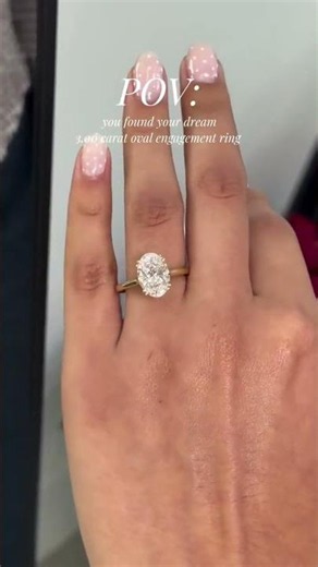 Oval Moissanite Solitaire Engagement Ring in Yellow Gold by Darby Diamonds