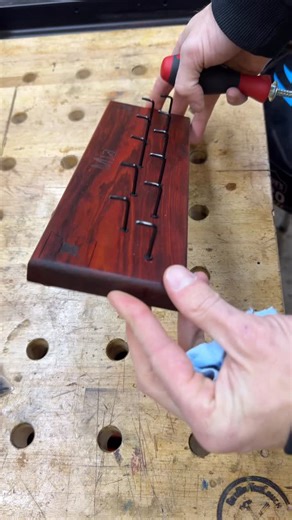 Scott Couch on Instagram: "These medal hooks were killing my fingers, so I tried a nut driver instead—and it worked surprisingly well. Wrapped the hook with a paper towel to protect the finish, and it threaded right in without a fight. Sometimes the simple tweaks save the day."