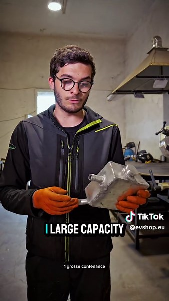 Louis made a custom cooling liquid tank for our racing Tesla Models 3. Ir fits! #evconversion #retrofit #evshopeu @marcareny1 @Laur @creaturica @Simion Andrei Alex @Jade @anamariaarsene593