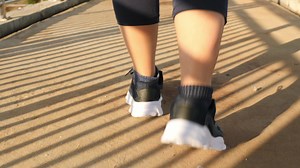 Download woman exercising on the overpass for free