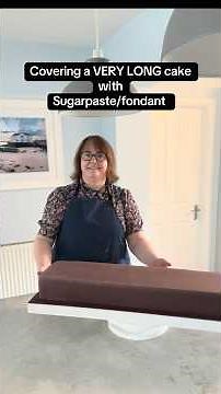 Today I’m covering a very long cake with sugarpaste or fondant #cake #cakedecorating #baking