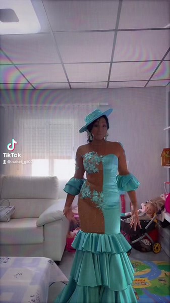 Vibrant Dance Performance in Turquoise Gown