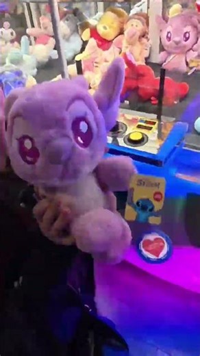Sam and claw machines, she wins every time!