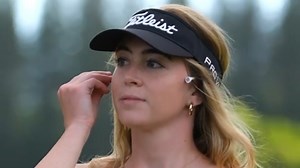 Grace Charis shows off incredible figure in plunging crop top on golf course