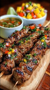 Jamaican Jerk Beef Skewers with Mango Salsa Ingredients: For the Jerk Beef: 1 lb (450 g) beef tenderloin, cut into 1-inch cubes 2 tbsp olive oil 2 tbsp soy sauce Recipe in First Coʍmеոτ 👇 Enjoy ❤️👇👇👇 | Fantastic Recipes