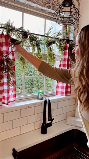 Jessica | Ruffles & Blush on Instagram: "One of my favorite hacks- Using towels as cafe curtains! These were from last season, but I’ve been keeping my eyes out for them to hit the shelves again. 👀 Let me know if you’d like the link to my small tension rod & curtain clips! 🎄♥️🫶🏼 Hope you had a wonderful weekend! Have you started decorating yet? #whitekitchen #coppersink #mycountryhome #americanfarmhousestyle #christmaskitchen #winterdecor #cafecurtains #diyhousetohome #cozyvibes #homesweet"
