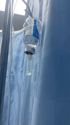 Close-Up of Medical IV Bag in Clinical Setting