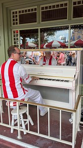 👻🎹 The Haunted Mansion has come to Main Street! Casey's Corner pianist Grayson plays "Grim Grinning Ghosts" and it's AWESOME! #disney #disneyworld #magickingdom #hauntedmansion #travel | Destinations To Travel